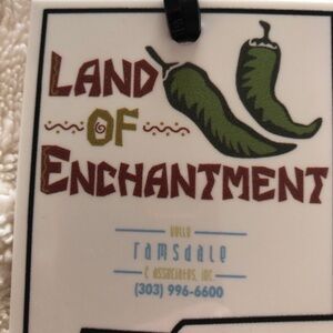 Source Unknown Land of Enchantment Sign with Green and Brown Accents